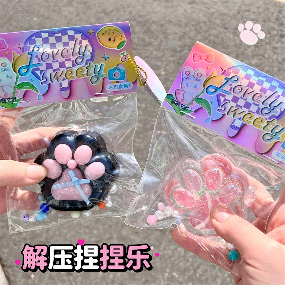 Pequeño libro rojo con el mismo estilo, grandes garras de gato perla, pellizcos, juguetes de descompresión, niña linda, artefacto de descompresión divertido al por mayor