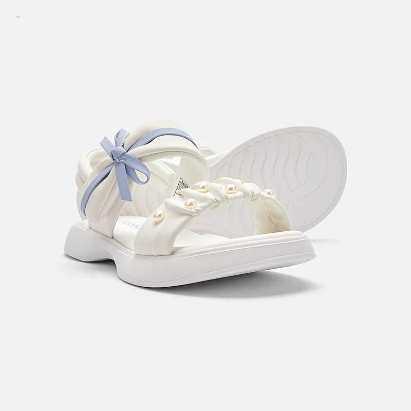 Zapatos de playa de moda de niñas versátiles 2026 verano nuevos zapatos de arco para niños Lefour zapatos de princesa huecos