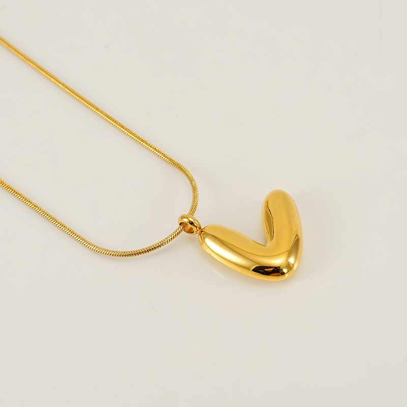 Burbujas transfronterizas 26 letras inglesas colgante brillante collar nicho universal oro acero titanio joyería collar