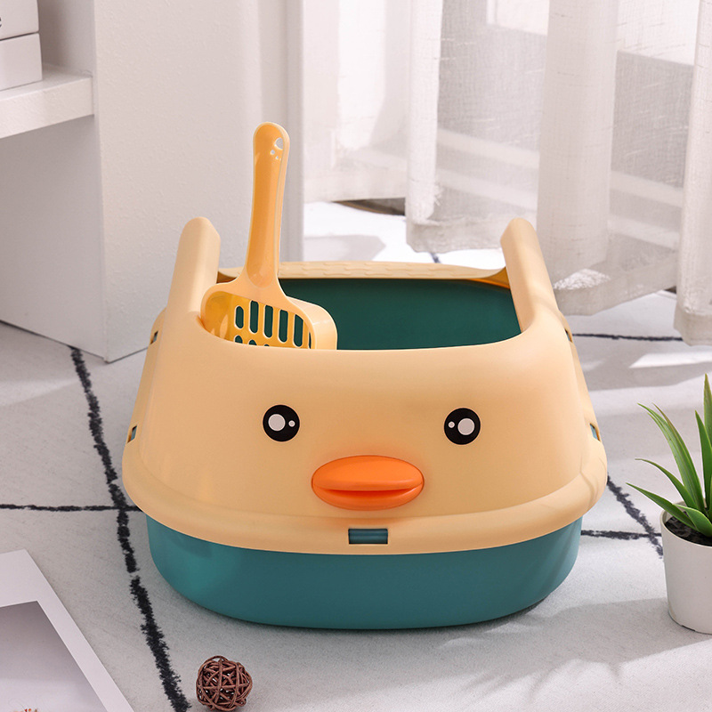 La caja de arena para gatos es grande para evitar sacar el pequeño pato amarillo, la caja de heces para gatos, el inodoro para gatos semicerrado, la caja de arena para gatos antisalpicaduras de gran tamaño