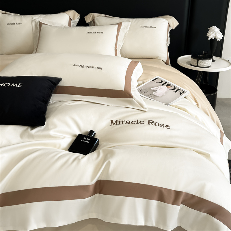 Cama de algodón de lujo ligero de alta gama de cuatro piezas de algodón 2025 nueva ropa de cama de tres piezas con funda de edredón de alta calidad