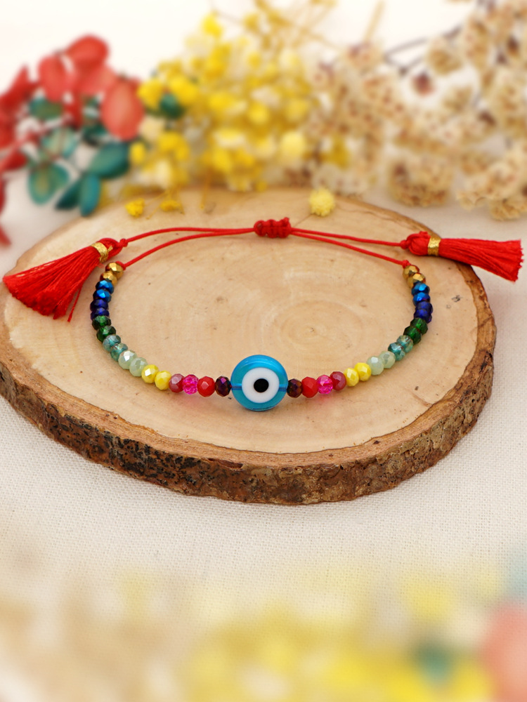 Simple Bohemian Ethnic Style Colored Glaze Blue Eye Beads Rainbow Crystal Beaded Tassel Couple Small Bracelet display picture 2