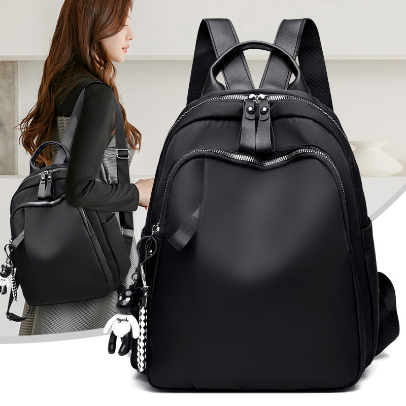 2024 nueva mochila pequeña Oxford casual para mujer simple y versátil bolso de madre ligero al aire libre mochila al por mayor