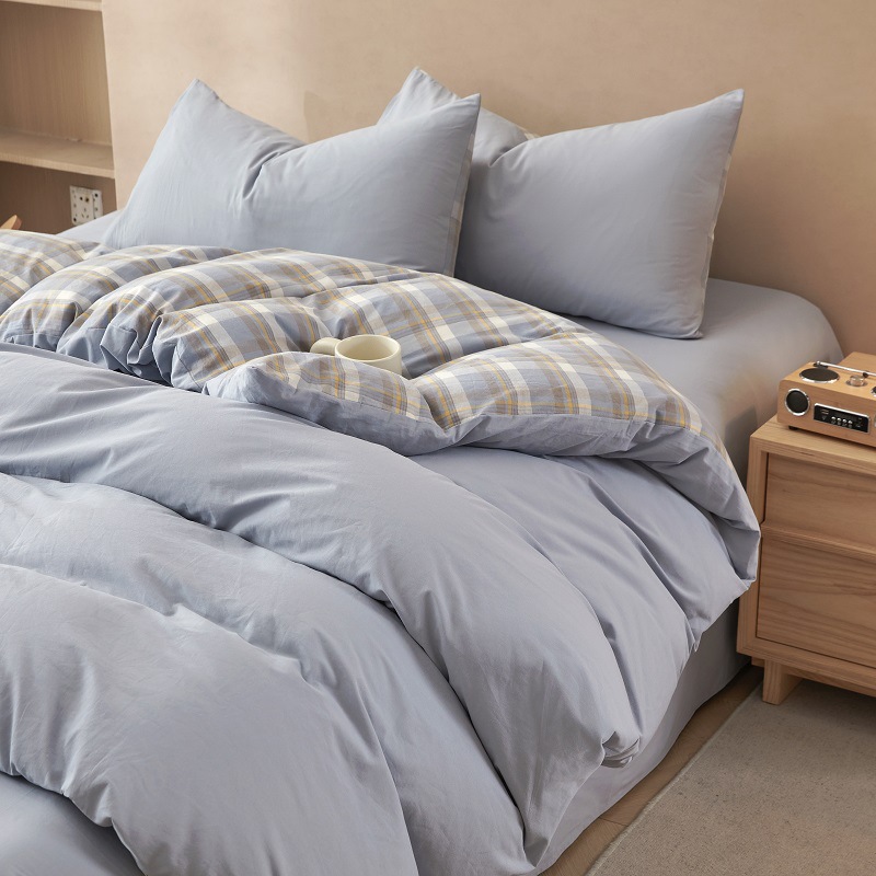 Nuevo traje de cama de algodón lavado de algodón de cuatro piezas de algodón 2025 nuevo traje de dormitorio de funda de edredón de sábana simple de tres piezas