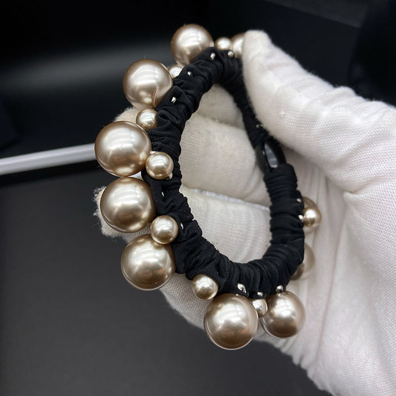 2025 nuevo estilo de cuerda de cabeza simple anillo de pelo de perlas anillo de intestino grande temperamento de alta elasticidad correa gruesa cuerda de pelo de mujer
