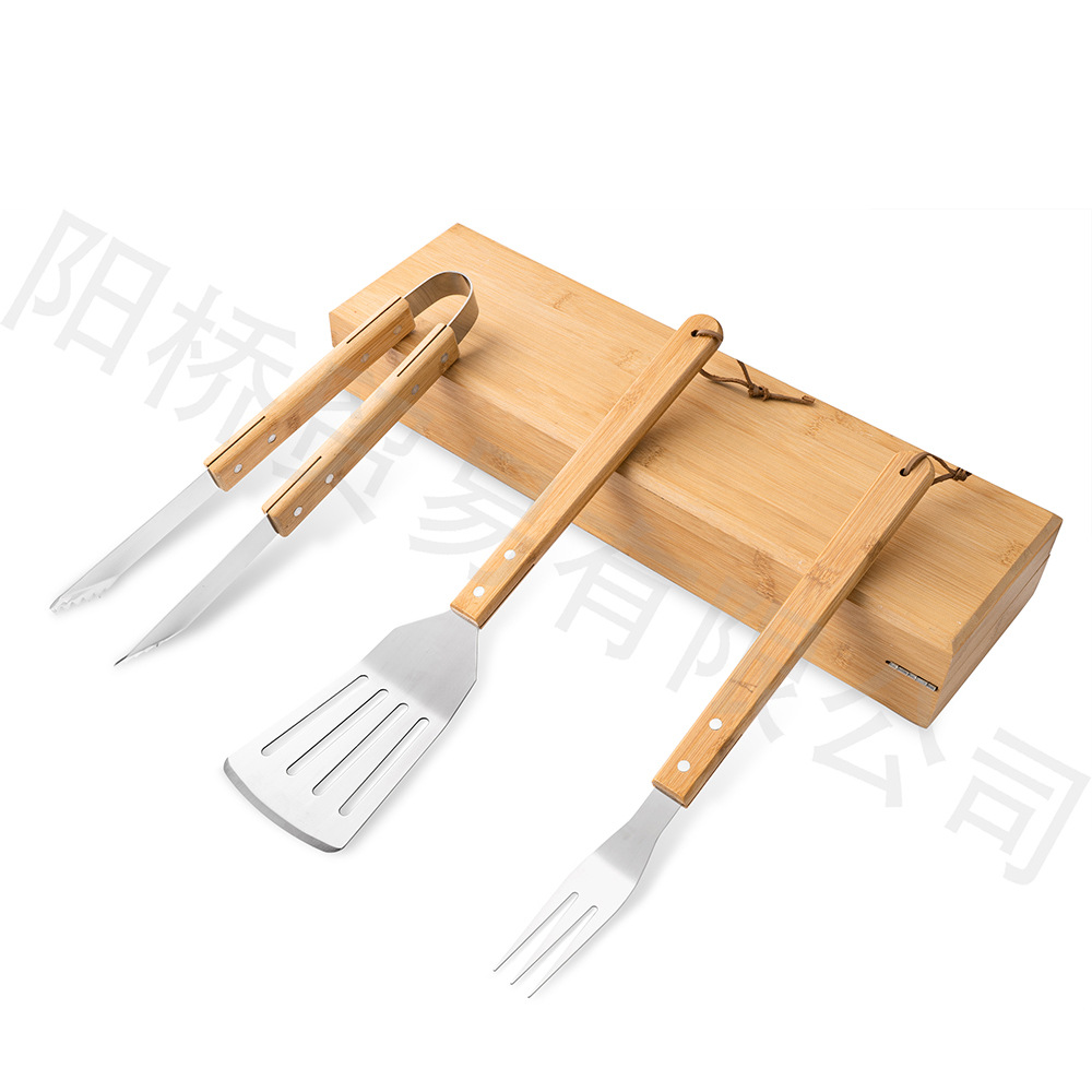 Exportación de la fábrica de acero inoxidable mango de madera herramientas de barbacoa conjunto de tres piezas al aire libre combinación portátil tenedor pala clip barbacoa parrilla