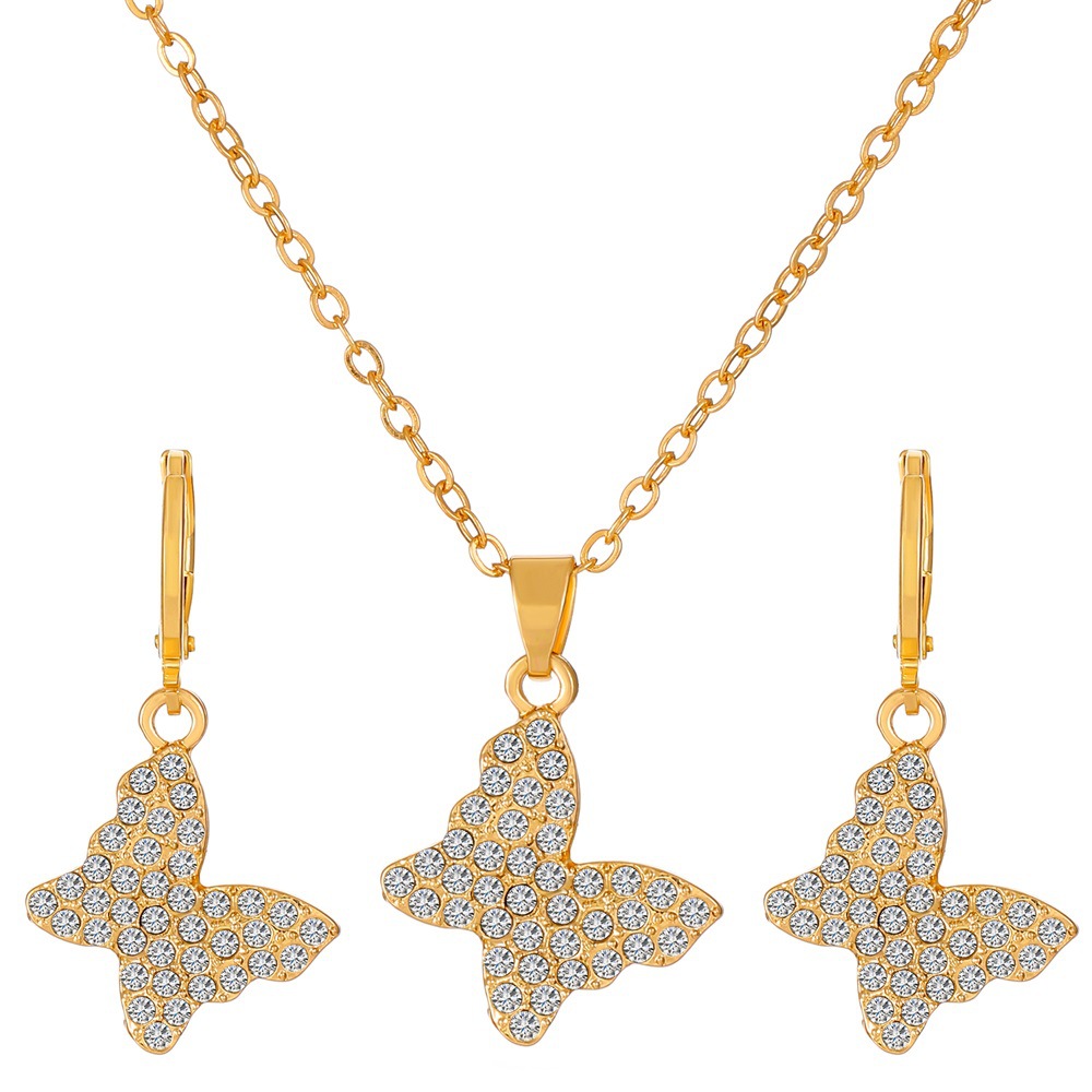 Transfronterizo europeo y americano Venta caliente joyería traje personalidad femenina diamante aleación corona mariposa collar pendientes traje ins moda