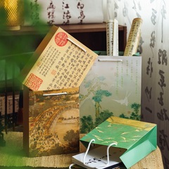 ニャンは古典的な中国風のお茶の贈り物の袋の古風な書道の祝日を述べて誕生日の贈り物の手提げ袋の卸売りを祝福します。