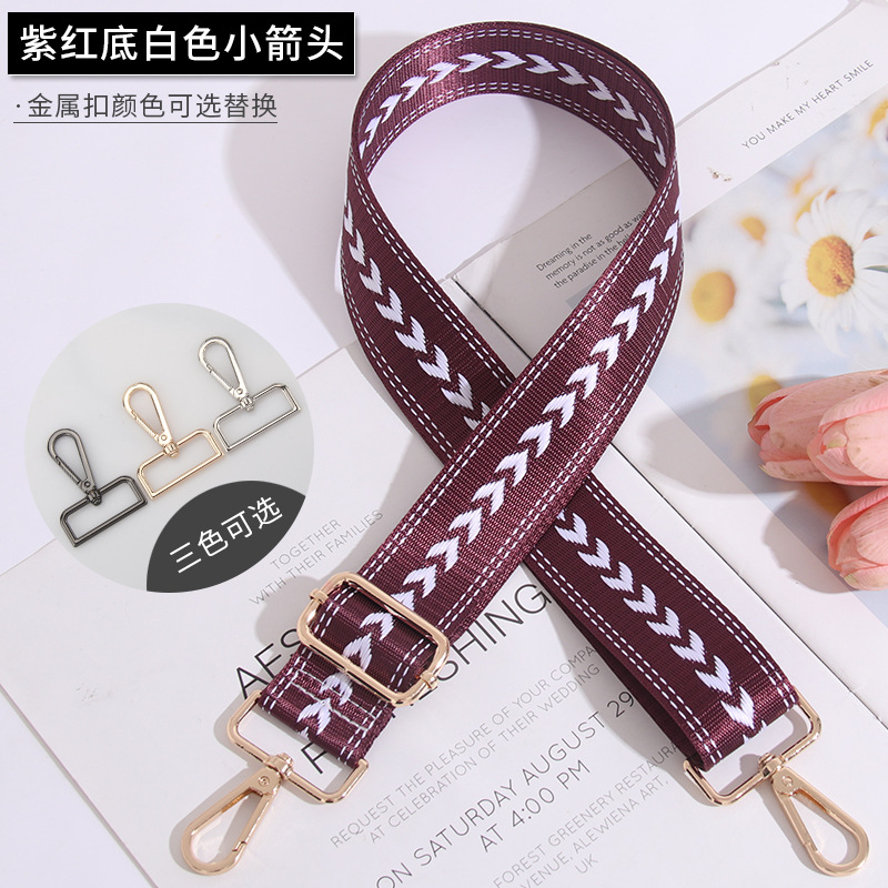 Small white arrow on purple background