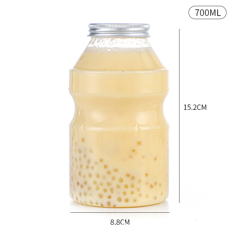 En stock cubo botella de plástico transparente PET jugo botella de bebidas grado alimenticio creativo desechable leche botella de té al por mayor