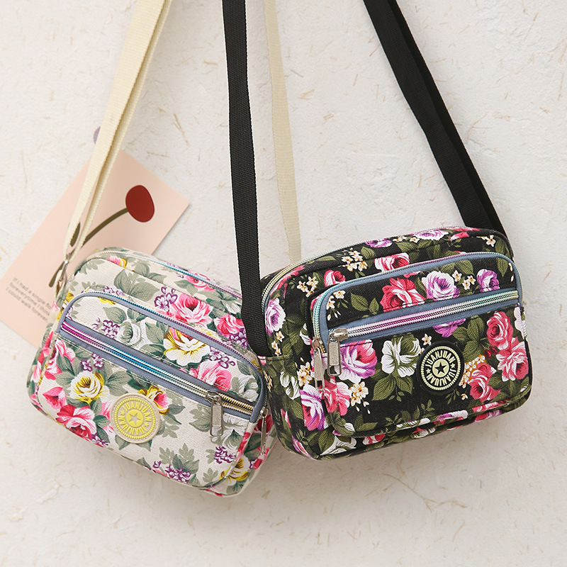 Wholesale Lightweight Business Wallet Multi-Layer Flower Canvas Crossbody Women's Bag Shoulder Bag Women's Casual Mom Cloth Bag Wholesale Lightweight Business Wallet Multi-Layer Flower Canvas Crossbody Women's Bag Shoulder Bag Women's Casual Mom Cloth Bag