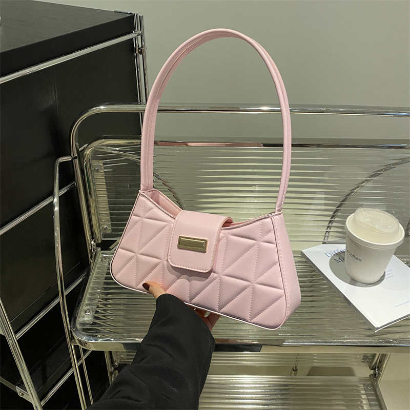 Bolso de nicho francés de textura occidental 2024 nuevo bolso femenino color sólido popular bandolera de hombro bolso de palo francés de axila