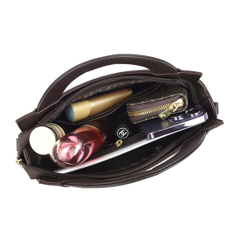 Bolso de mujer 2023 nuevo estilo nacional artístico costura moda mujer bolsa de sillín portátil hombro bolsa de mensajero al por mayor