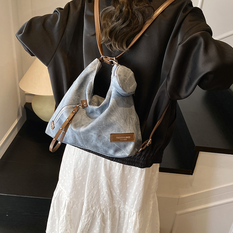 Mochila coreana de moda moda ocio 2025 nueva mochila de hombro de viaje simple de gran capacidad