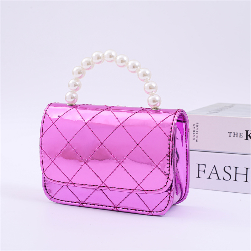 2025 primavera y verano estilo caliente moda casual niños dulces bolsa de gelatina mini bolso de mensajero de un solo hombro variedad al por mayor