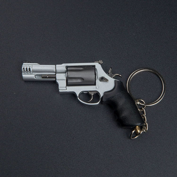 Маленький металлический revolver (пистолет-игрушка), брелок