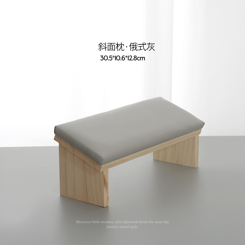 Almohada de mano para manicura de estilo japonés cuidadosamente seleccionada, superficie de cuero suave, madera biselada, almohada de mano especial estilo normcore de café con leche para salones de uñas