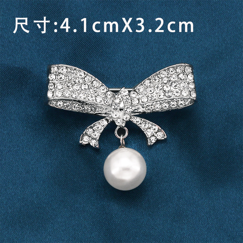 Broche à nœud papillon tendance en alliage anti-exposition haut de gamme, incrustée de diamants, style Coran, ornée de strass._voghion.com