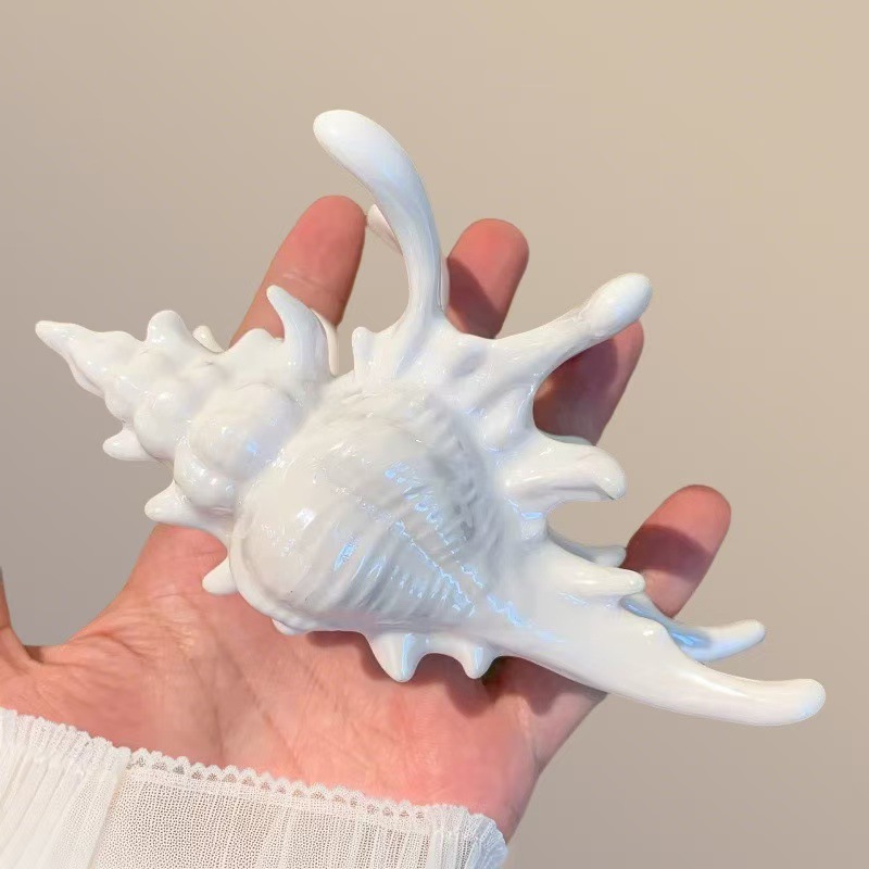 Pearl white conch clip