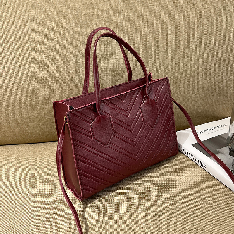 2023 nuevo estilo coreano de moda relieve V-patrón diamante bolso de hombro simple bolso de mano casual