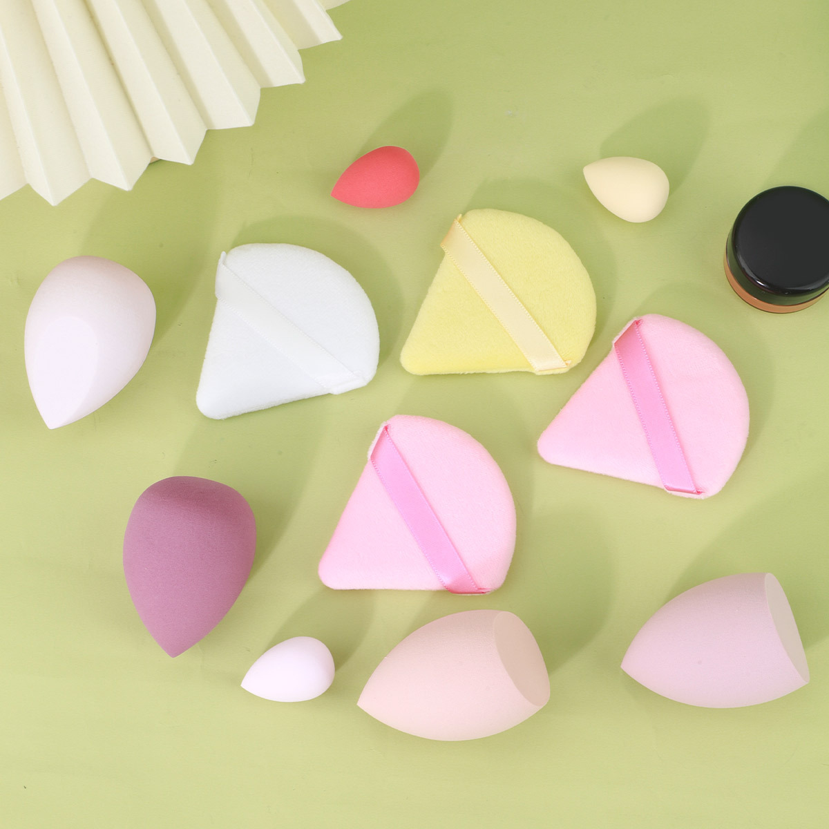 Huevos de maquillaje de macarrón transfronterizos 11 piezas de polvo conjunto de polvo de maquillaje húmedo no comer polvo esponja de maquillaje huevo de maquillaje de color