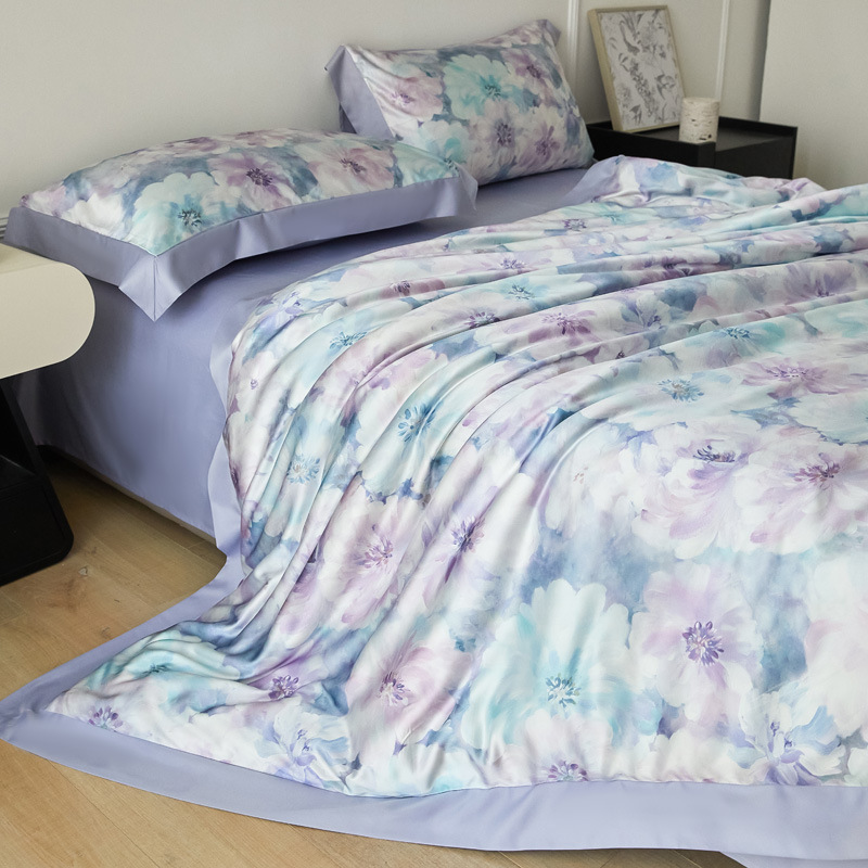 Cama de seda de hielo de verano de cuatro piezas de lujo ligero de alta gama 2025 nueva funda de edredón de sábana de tres piezas ropa de cama de seda lavada