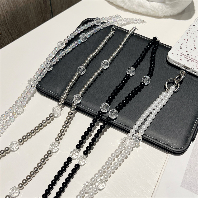 Popular online influencer-style mobile phone lanyard for women, crossbody or backpack style, extended chain, high-end fashion pearl chain clip pendant.