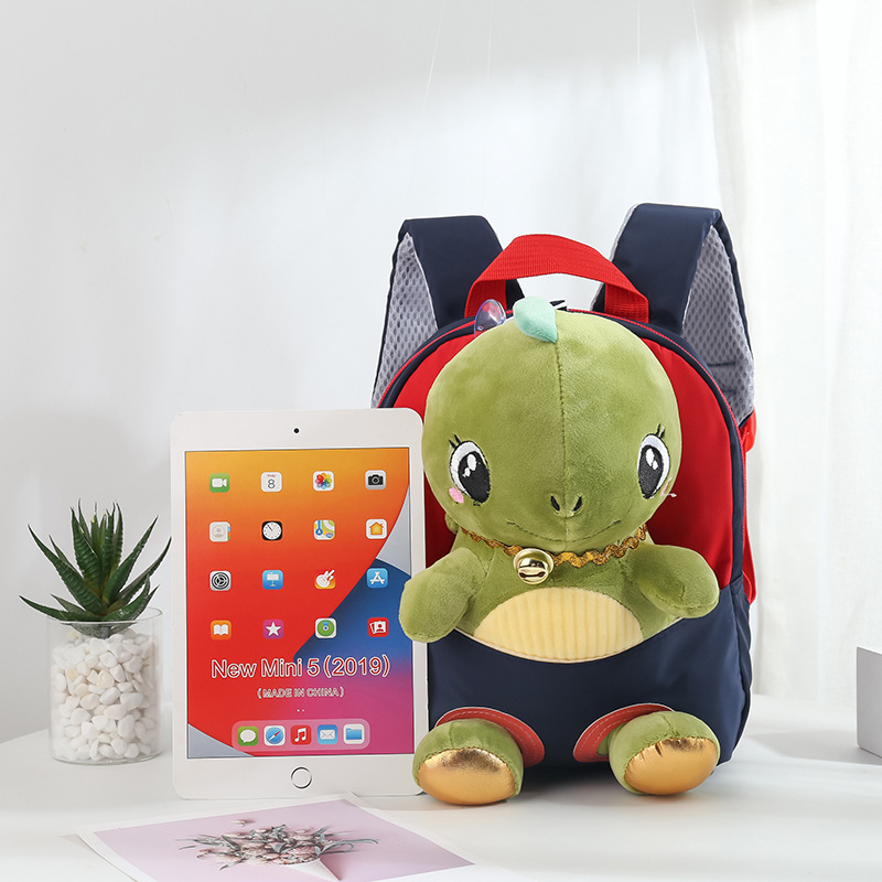 Fábrica de stock nuevo mochila infantil de dibujos animados muñecas de peluche dinosaurios desmontables mochila de jardín de infantes comercio exterior