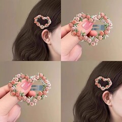 高級感のあるピンクの花のヘアピンの女性2025新型の甘い愛のbbクリップの額の側の前髪の髪の飾り