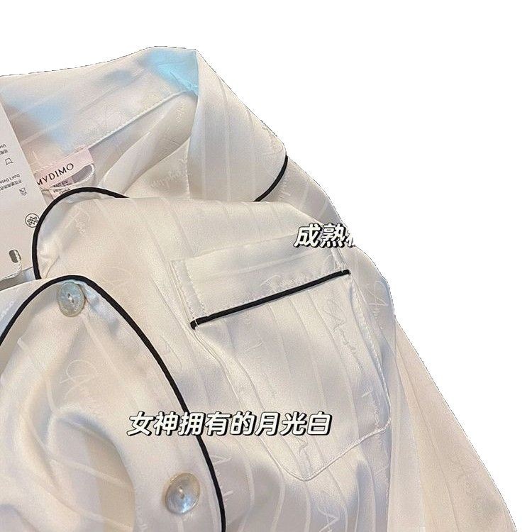 Pajamas de pareja de seda de hielo de alta calidad primavera y otoño de mujeres 2025 pantalones de manga larga de seda de imitación nueva ropa para el hogar de hombres