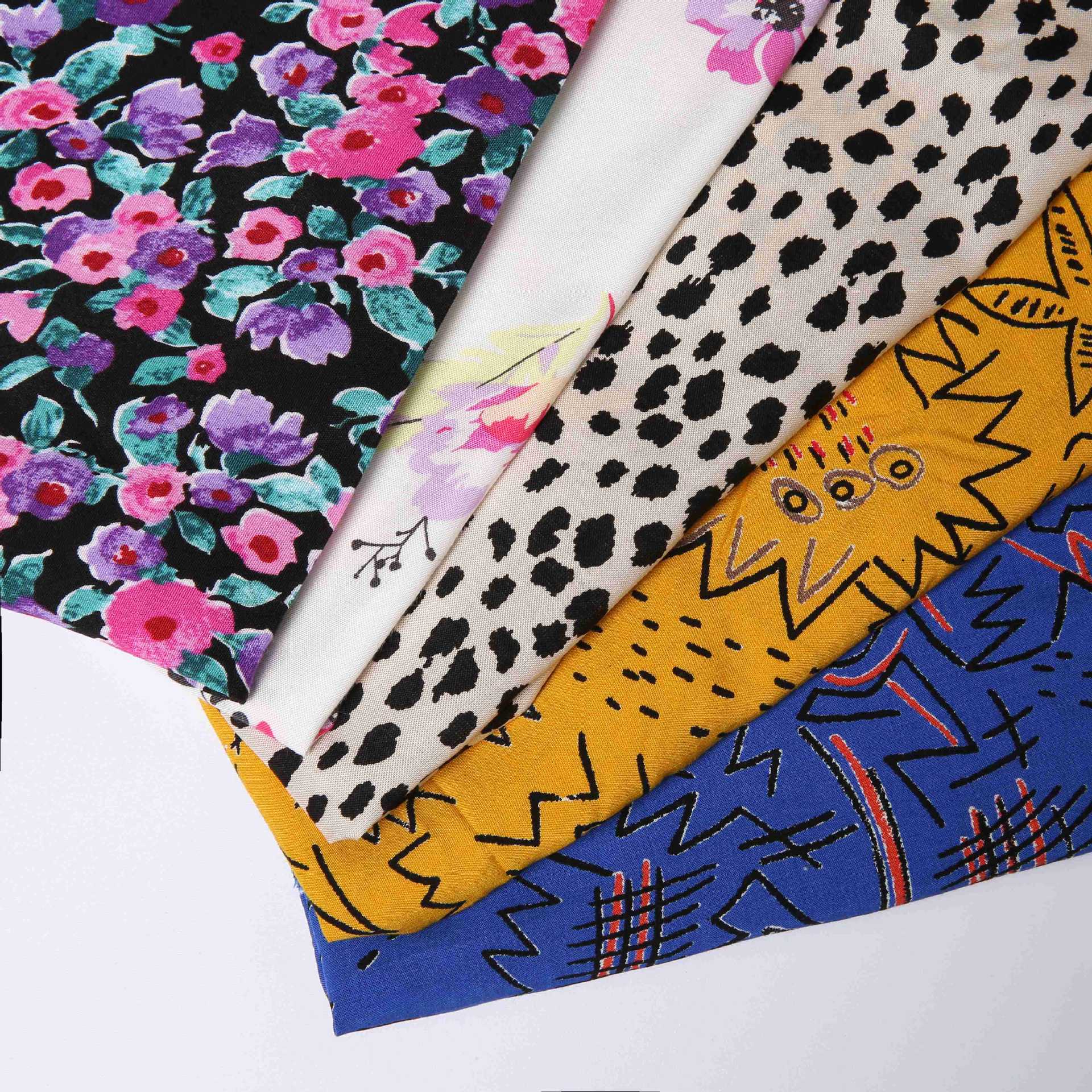 Fábrica de suministro directo diseño 100% tela de rayon damas falda de verano tela transpirable suave delgada
