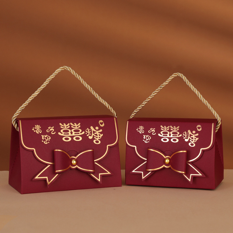 Caja de dulces de boda Boda 2024 Nuevo caramelo portátil de alta gama Empaquetado de dulces de boda Caja de regalo Bolsa vacía