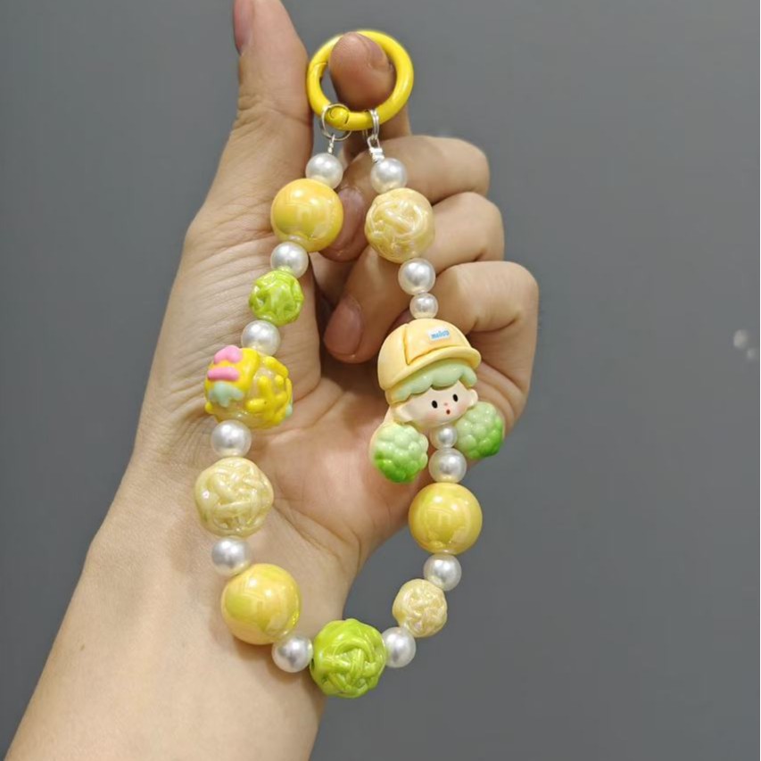 Nuevo colgante de cadena de teléfonos móviles de dibujos animados palomitas de maíz colgante de llavero creativo colgante de bolsas de perlas pintadas a mano