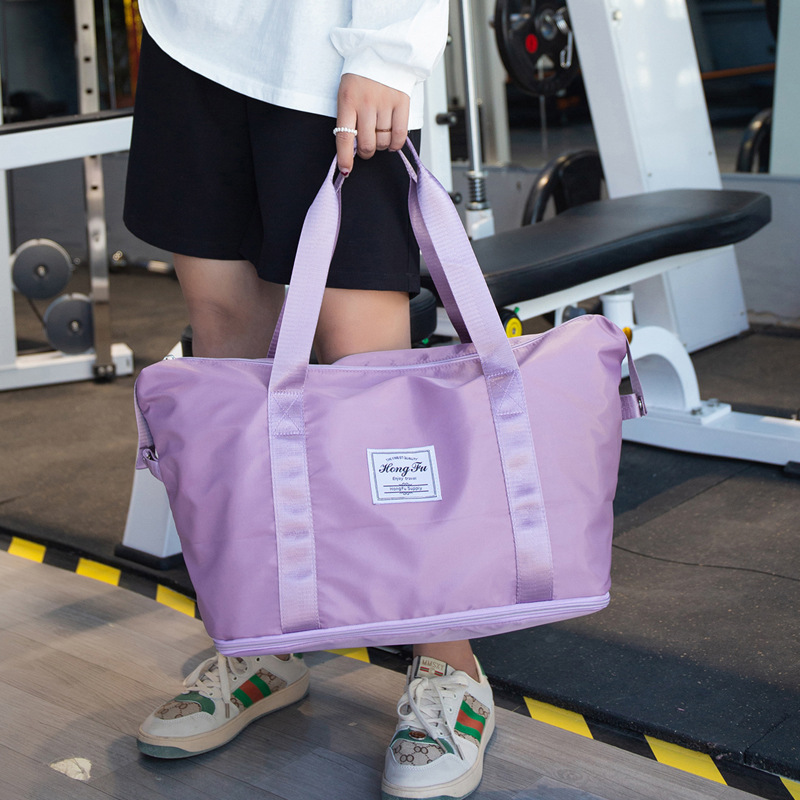 Bolsa de viaje de corta distancia portátil de gran capacidad bolsa de equipaje impermeable de moda para mujer bolsa de embarque de almacenamiento de viaje para hombres