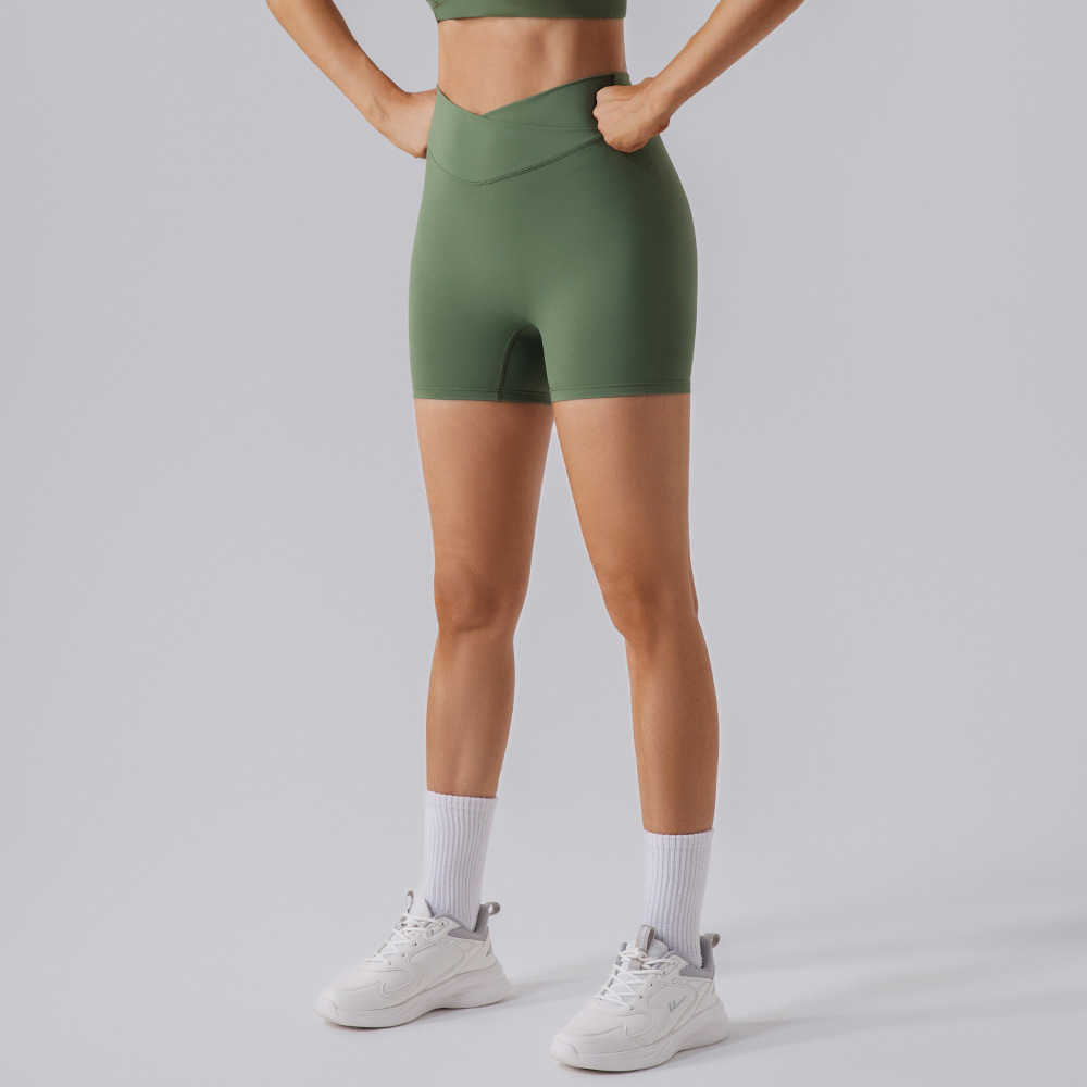 Procesamiento personalizado europeo y americano elástico mel桃 hips fitness pantalones cortos desnudos secado rápido sexy para elevar las hips de yoga de mujer panty