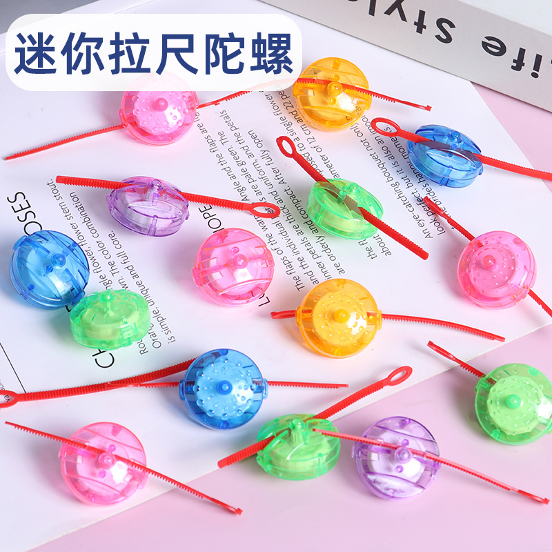 Plástico giratorio pequeño giroscopio pequeño giroscopio infantil juguetes tradicionales regalos niños transfronterizos pequeños