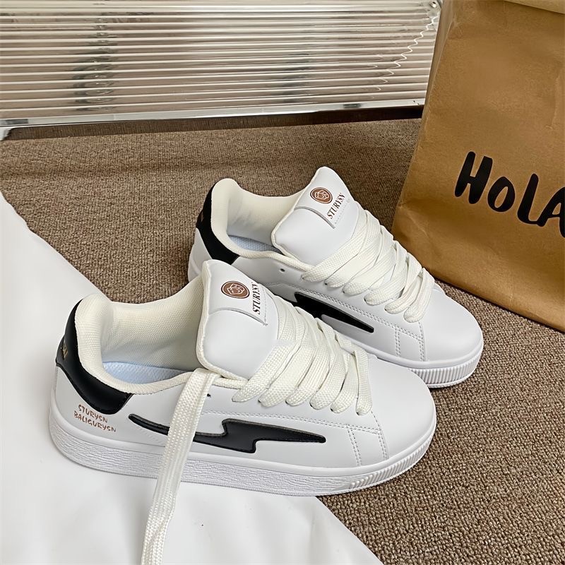 Zapatos de skate de pareja de tamaño grande zapatos de mujer zapatos de moda masculinos suelos suaves no cansados zapatos de comercio exterior hombres y mujeres
