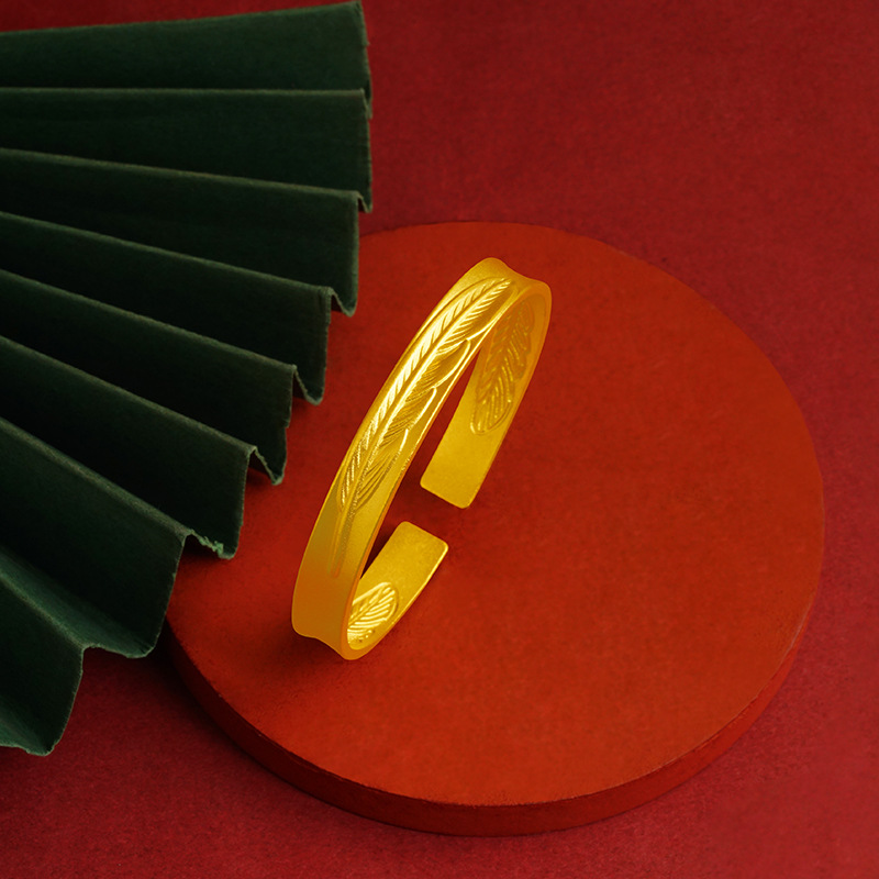 Pulsera de plumas de aleación de cobre pulsera de mujer apertura ajustable moda joyería retro pulsera de plumas ligeras suministro directo de fábrica