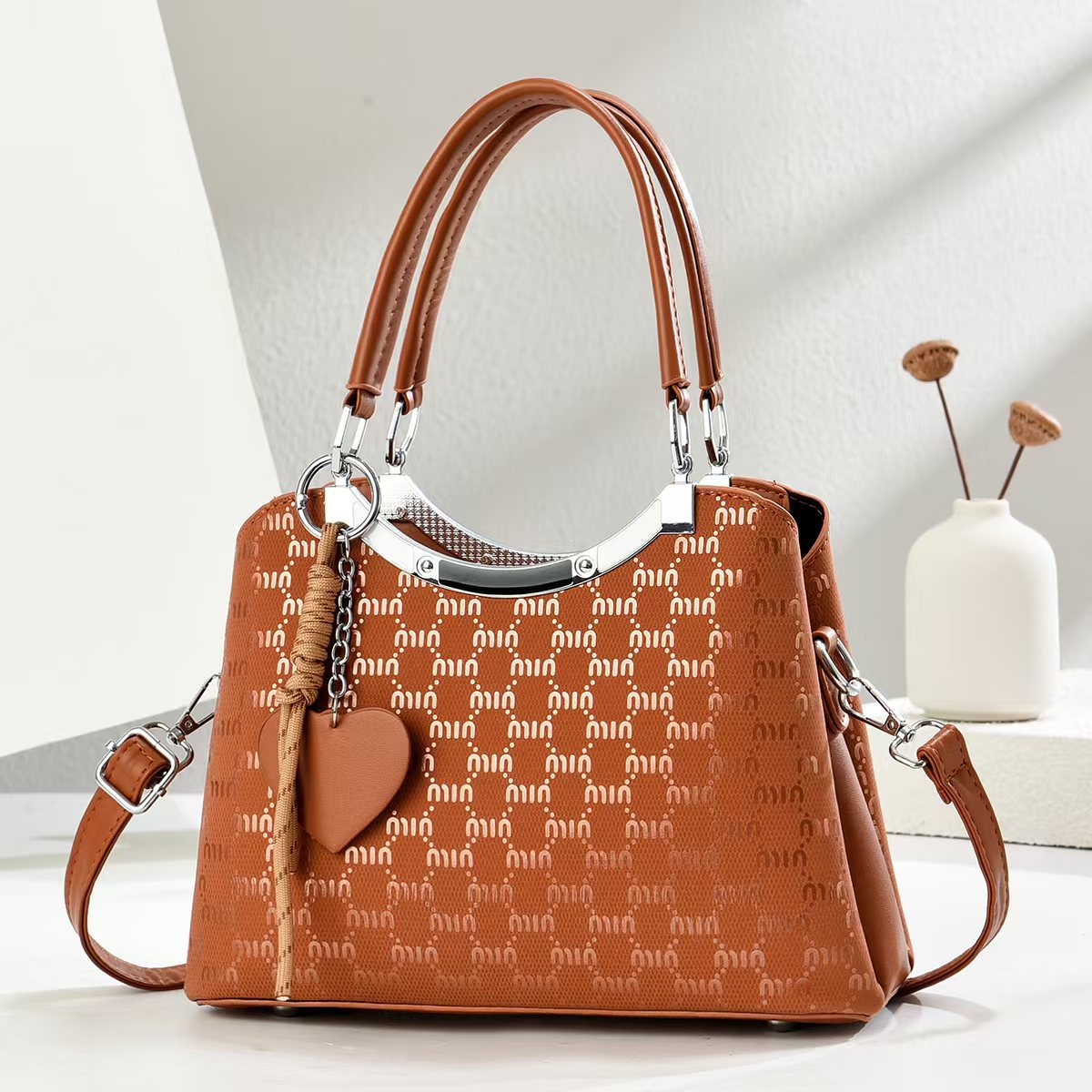 Marca de gran capacidad bolso tote francés nuevo temperamento femenino bolso femenino de moda europea y americana bolso de hombro de viaje de compras de ocio