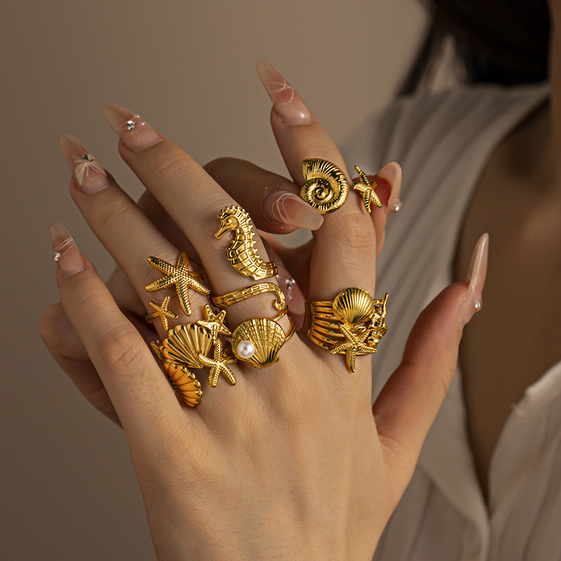 Anillo de acero inoxidable europeo y americano de diseño de nicho femenino conchas anillo de moda para mujeres joyerías