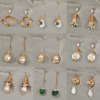 Design fashionable long brand earrings handmade from pearl with tassels, European style, flowered