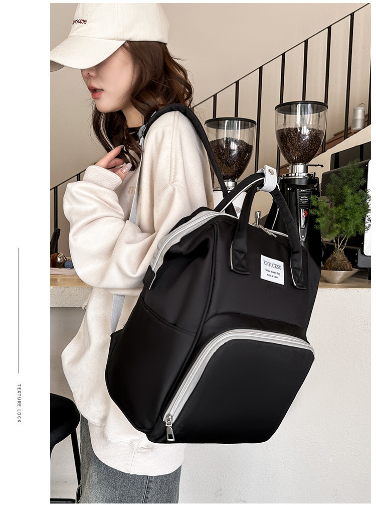 Solid-color lightweight mom bag, a backpack for taking kids out, multi-functional large-capacity mother and baby bag for girls undefined