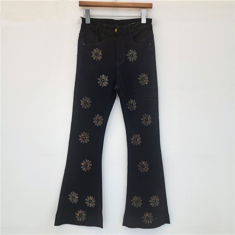 Vintage americano lavado con agua elástico flor caliente taladro de moda jeans recto para mujeres pantalones largos largos casuales de piernas anchas