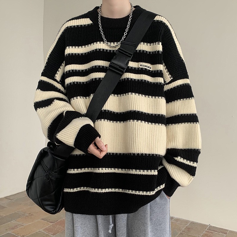 Suéter de punto hueco a rayas de color retro americano otoño e invierno nuevo estilo estilo de Hong Kong solapa suelta tendencia de suéter casual