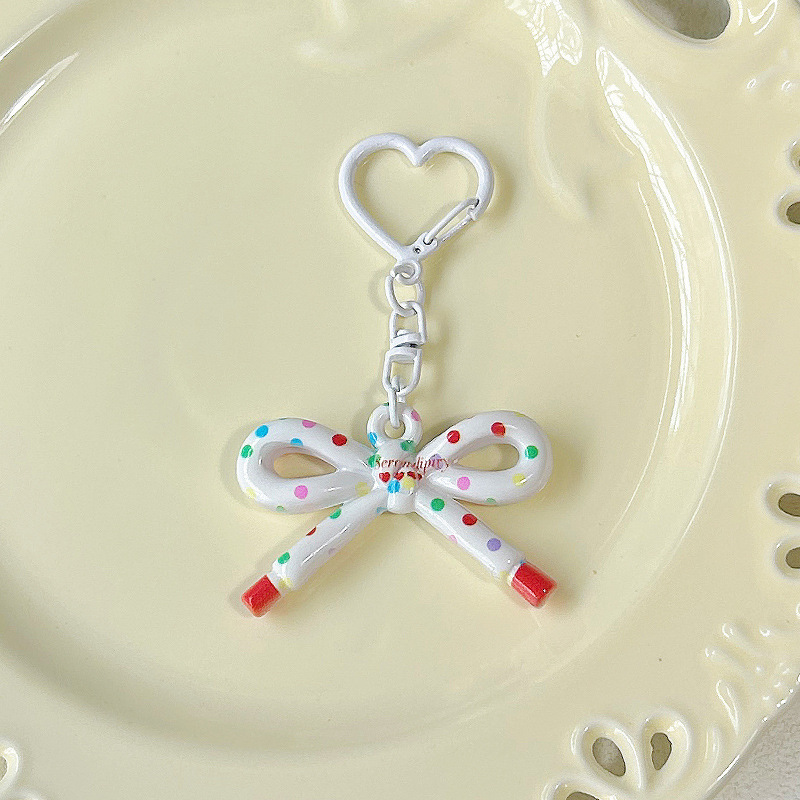 かわいい両面プリント中空弓キーホルダー diy ジュエリーペンダントバッグ携帯電話ペンダントギフトアクセサリー|undefined