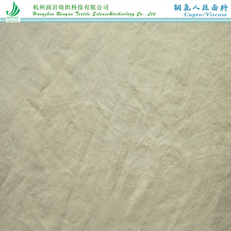 120D*120D铜氨人丝面料Cupro铜氨丝人丝斜纹砂洗115gsm宾霸铜氨丝