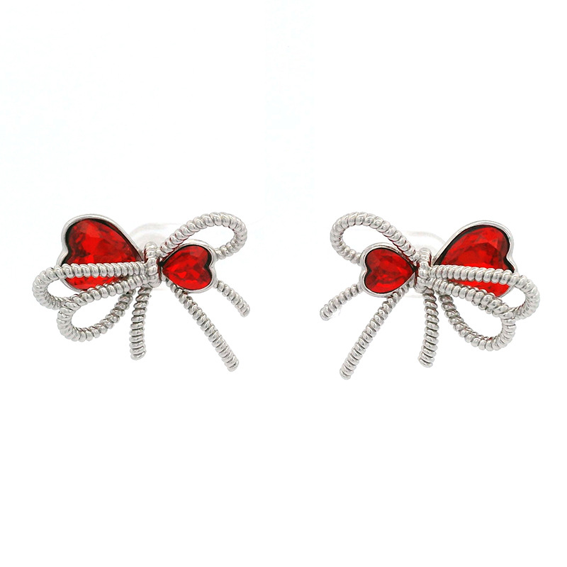 Xuping coreano estilo de moda en forma de corazón de cristal arco pendientes de arco ligero lujo alto sentido de moda aretes dulces para mujeres