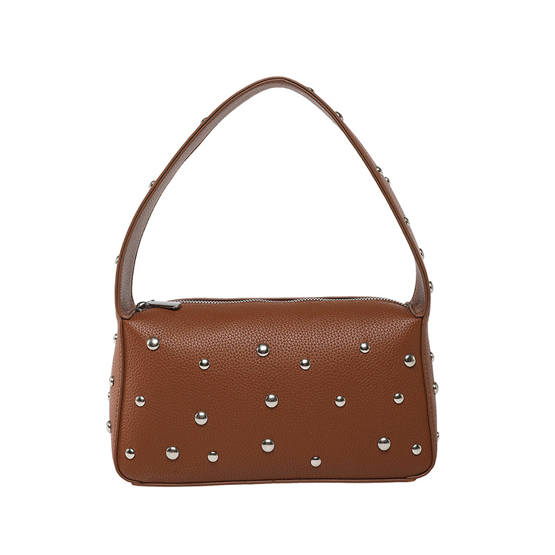Bolso de axila con textura transfronteriza 2025 verano nuevo bolso femenino bolso de remache personalizado bolso de hombro con patrón de lichi de moda