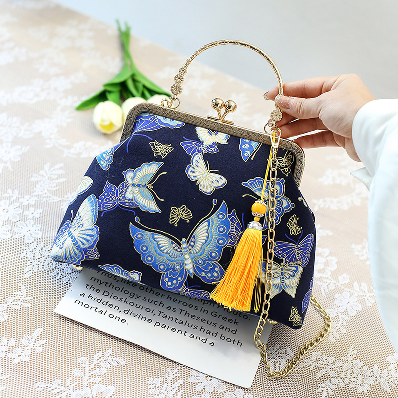 Bolso cruzado de un solo hombro estilo antiguo a juego bolso cheongsam bolso transfronterizo nuevo estilo retro estilo chino bolso portátil de oro de boca terminado