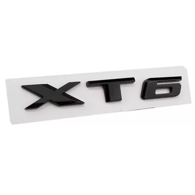 and XT5 models; silver — Car logo - standard-xt6-glossy-black